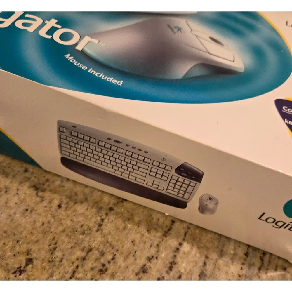 Logitech Cordless Freedom Navigator Keyboard Wheel Mouse Receiver User Guide